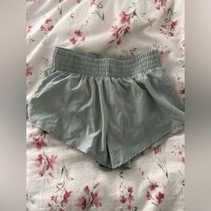 sage green athletic shorts, with inseam
